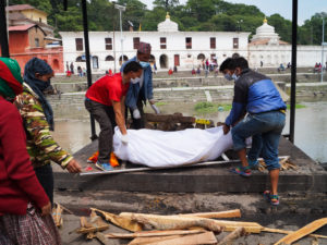 Quake Survivors Bewail Their Fortunes at Funeral Pyres of Loved Ones
