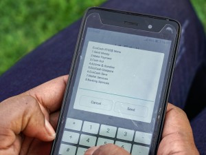 In Cash-Strapped Zimbabwe, Convenience of Mobile Money Comes at a Steep Cost